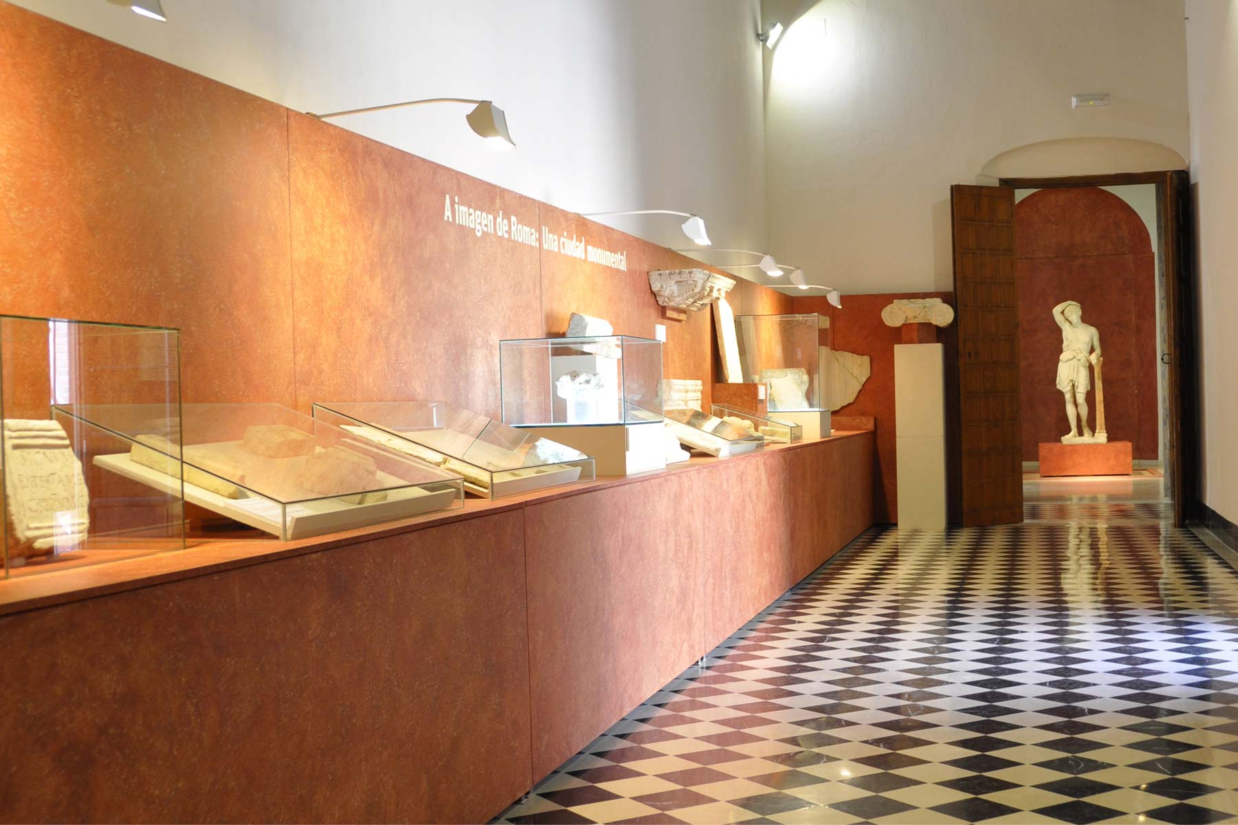 The Municipal Historical Museum has an interesting collection of prehistoric metal pieces, three stelae of warriors, the "Plaque of Ecija" (a unique piece of Tartessian gold work), splendid Roman mosaics and sculptures such as the "Wounded Amazon", and interesting collections of inscriptions, capitals, mosaics and other domestic material from the Roman and Islamic periods.